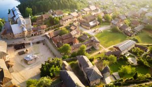 Bourg de Brindas médiéval, imaginé par Adobe Firefly (IA générative)